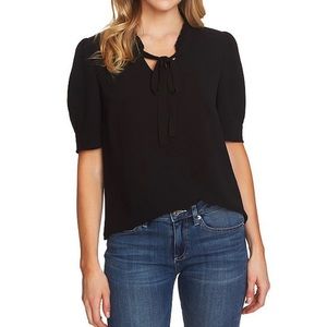 Large Cece black blouse with bow at neck and slight puff short sleeves